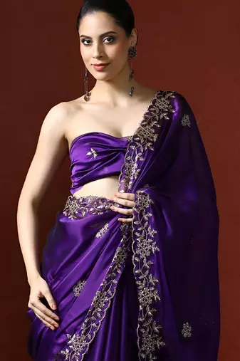 Purple ethnic motifs embroidered sequinned saree