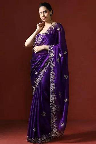 Purple ethnic motifs embroidered sequinned saree