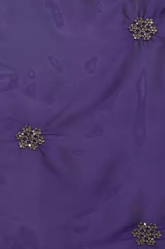 Purple ethnic motifs embroidered sequinned saree
