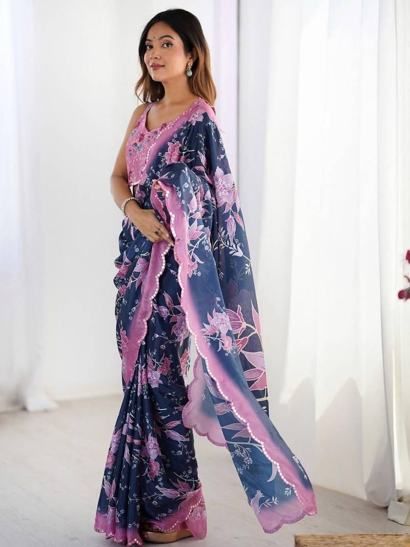 White floral kutchi embroidery silk blend saree