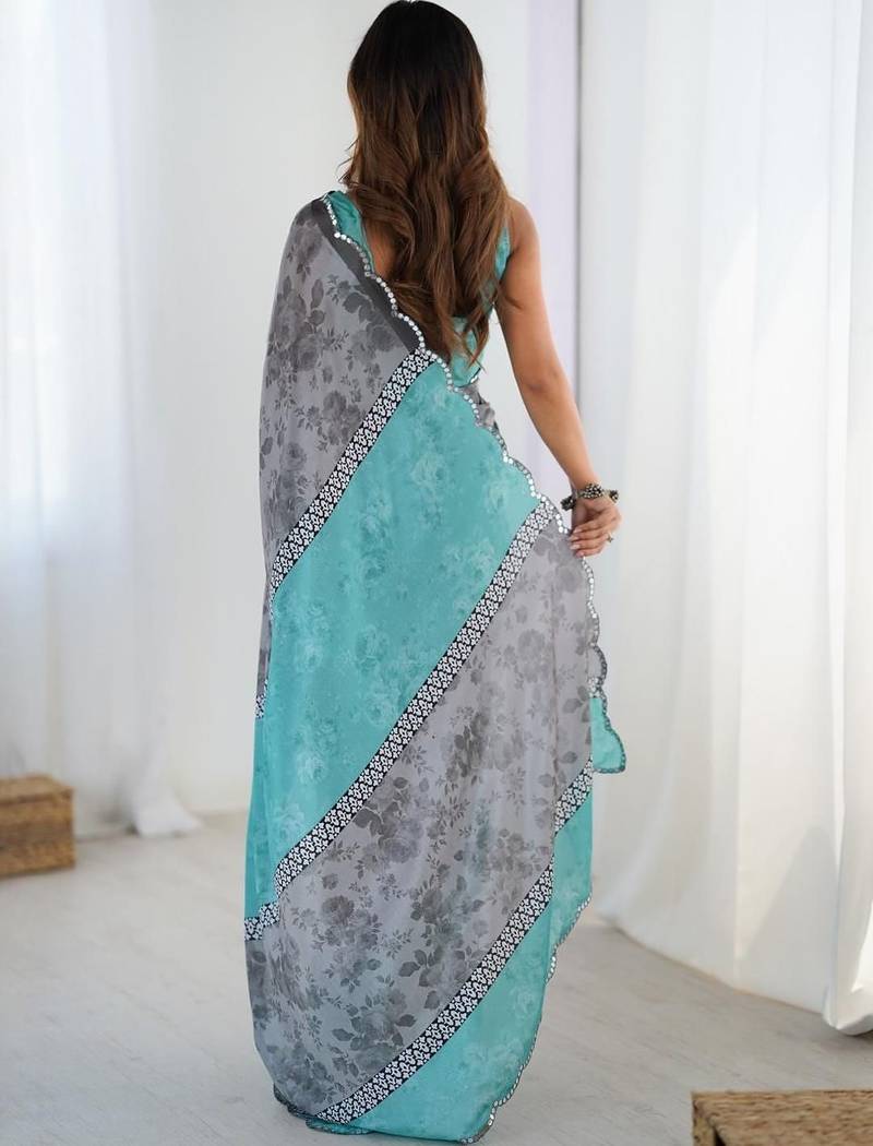 cream floral kutchi embroidery silk blend saree
