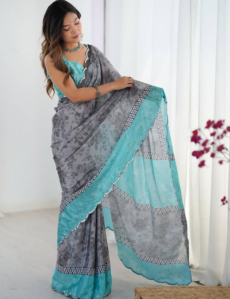 cream floral kutchi embroidery silk blend saree