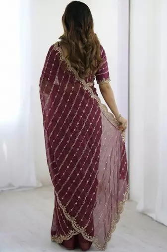 Maroon embellished embroidered satin heavy work saree