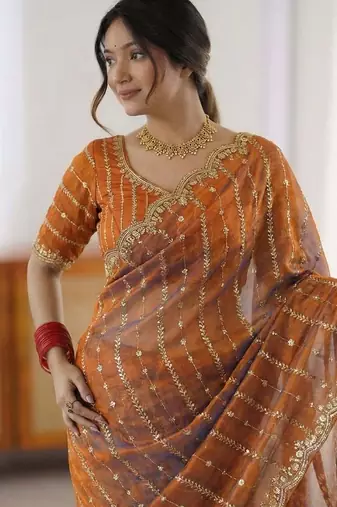 orange embellished embroidered satin saree