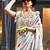 blue ethnic motifs printed satin bagru saree