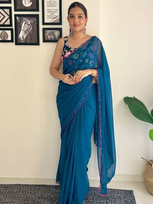 Teal embroidered saree 1