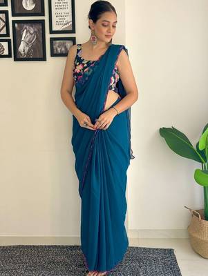 Teal embroidered saree 2