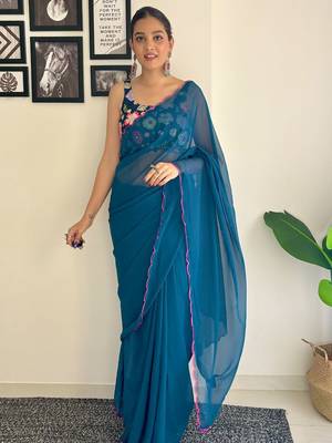Teal embroidered saree 5