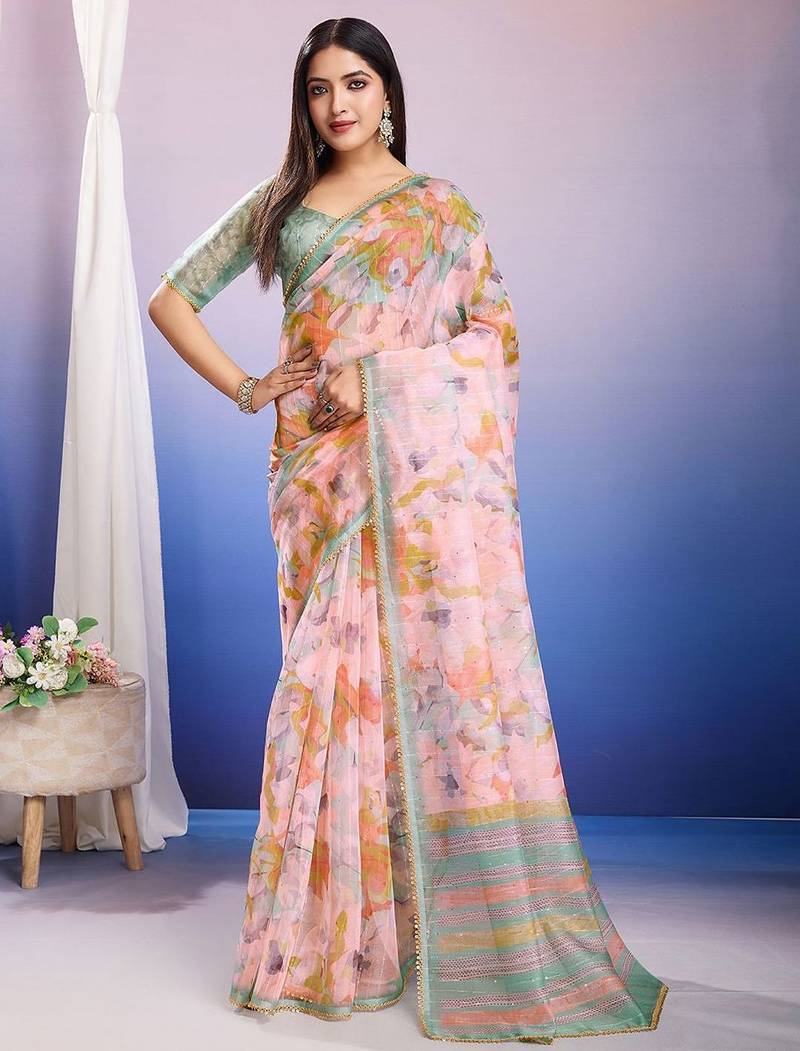 Peach floral sequinned organza saree