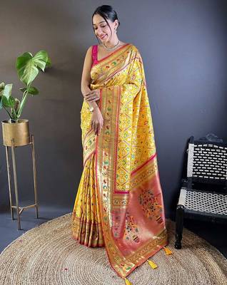yellow woven design zari silk blend designer patola saree 1