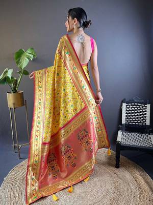 yellow woven design zari silk blend designer patola saree 3