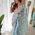 blue blue & white floral printed sequinned saree