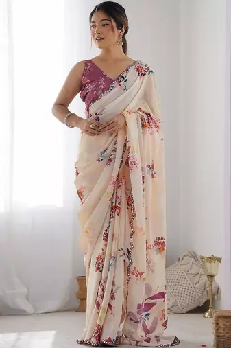 Cream floral mirror work poly georgette saree