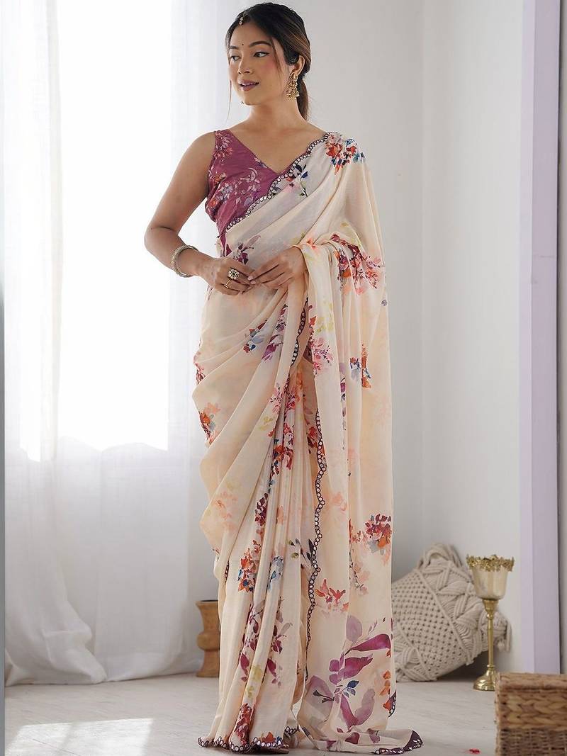 Cream floral mirror work poly georgette saree