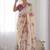 Cream floral mirror work poly georgette saree