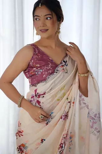 Cream floral mirror work poly georgette saree