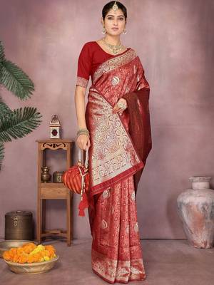 Maroon ethnic motifs woven design zari heavy work saree 1