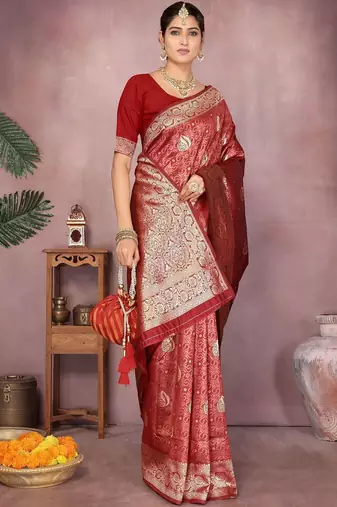 Maroon ethnic motifs woven design zari heavy work saree