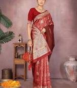 Maroon ethnic motifs woven design zari heavy work saree