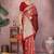 Maroon ethnic motifs woven design zari heavy work saree