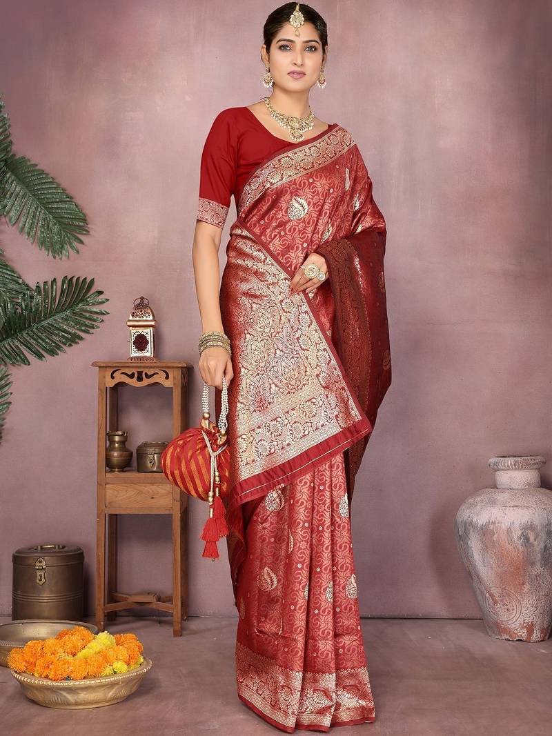 Maroon ethnic motifs woven design zari heavy work saree