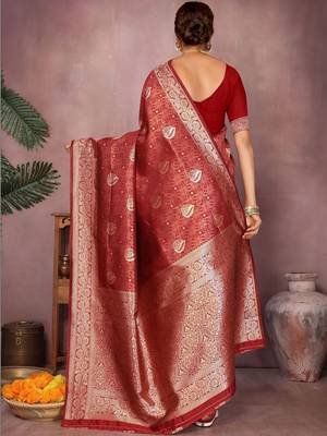 Maroon ethnic motifs woven design zari heavy work saree 2