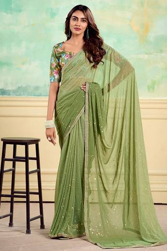 green embellished saree with unstitched blouse piece