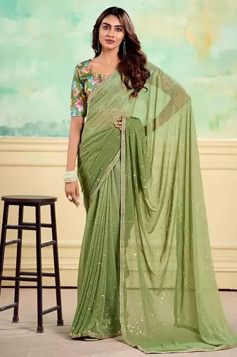 green embellished saree with unstitched blouse piece