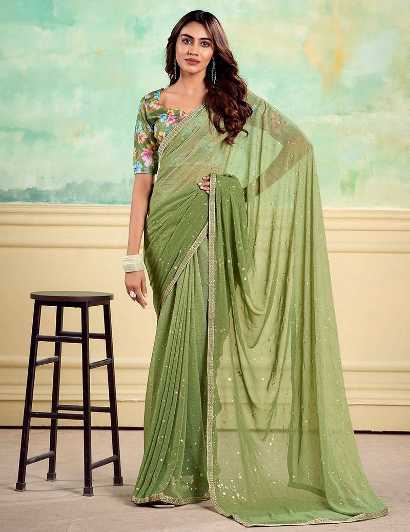 green embellished saree with unstitched blouse piece