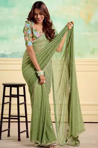 green embellished saree with unstitched blouse piece