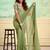 green embellished saree with unstitched blouse piece