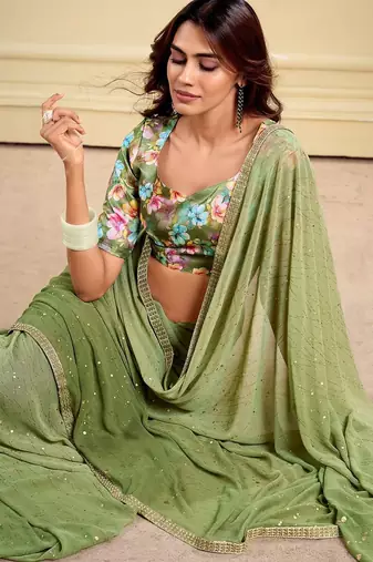 green embellished saree with unstitched blouse piece