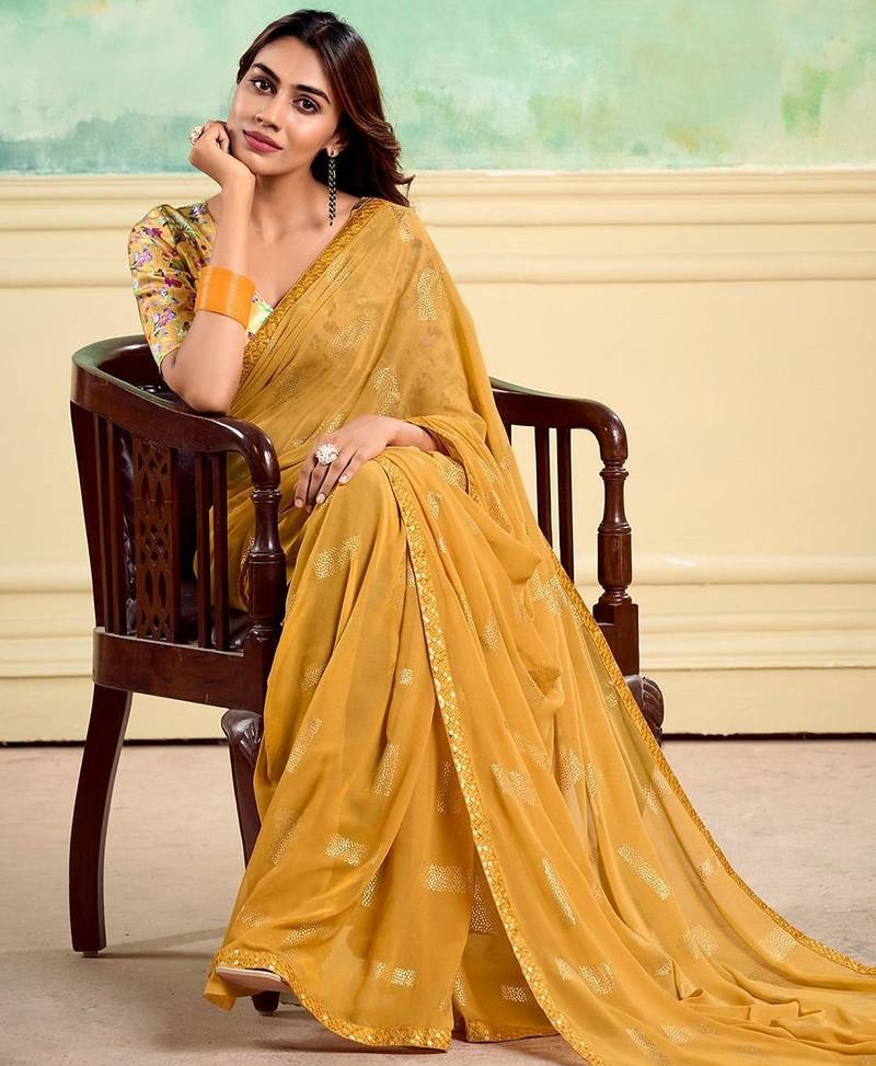 Yellow embellished saree with embellished border