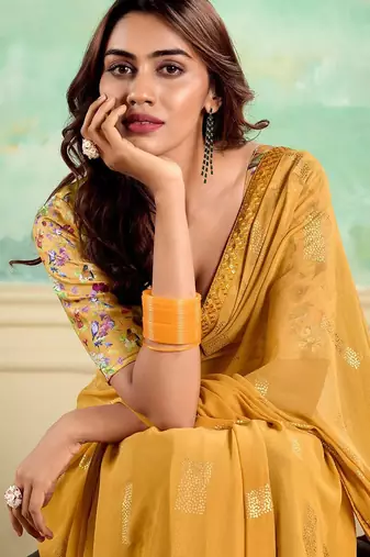 Yellow embellished saree with embellished border