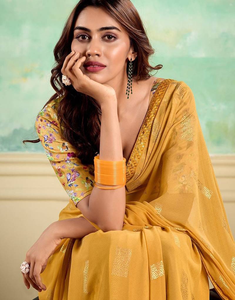 Yellow embellished saree with embellished border