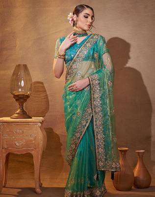 turquoise ethnic motifs embroidered tissue saree with unstitched blouse piece 1