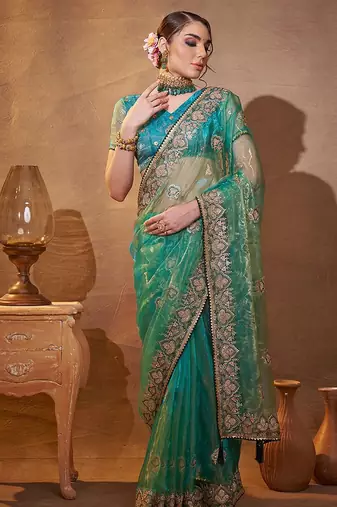 turquoise ethnic motifs embroidered tissue saree with unstitched blouse piece