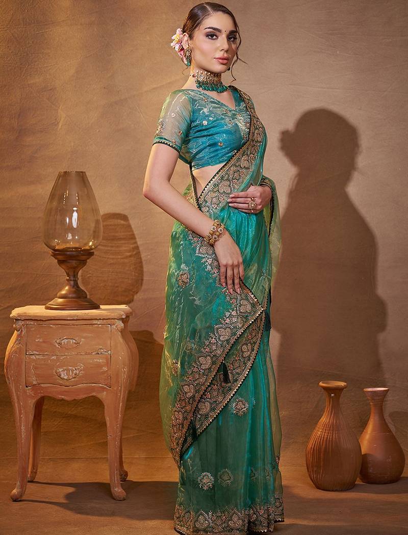 turquoise ethnic motifs embroidered tissue saree with unstitched blouse piece