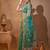 turquoise ethnic motifs embroidered tissue saree with unstitched blouse piece