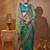 turquoise ethnic motifs embroidered tissue saree with unstitched blouse piece
