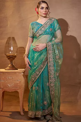 turquoise ethnic motifs embroidered tissue saree with unstitched blouse piece