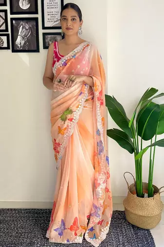 Orange floral sequinned embroidery  saree