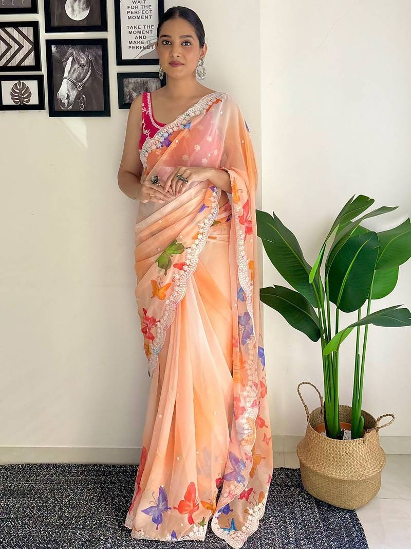 Orange floral sequinned embroidery  saree