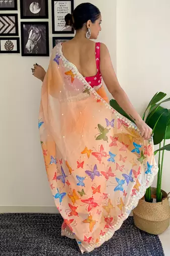 Orange floral sequinned embroidery  saree
