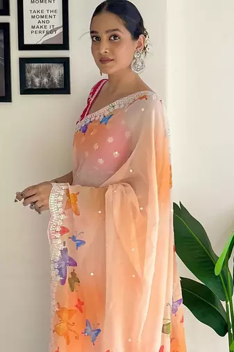 Orange floral sequinned embroidery  saree