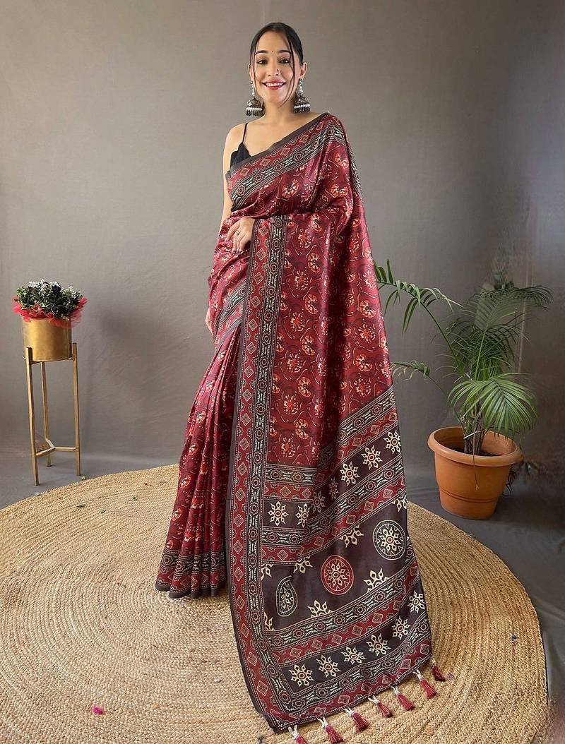 Red ethnic motifs printed saree