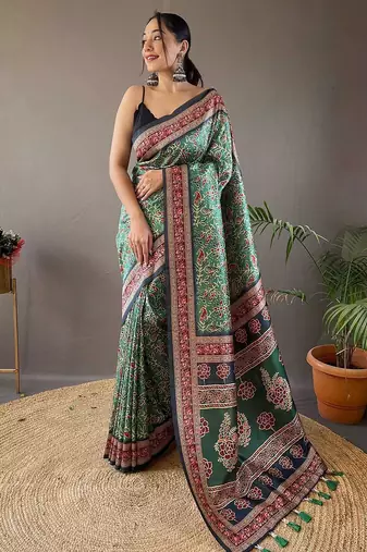 green kalamkari saree with blouse piece