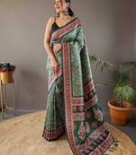 green kalamkari saree with blouse piece