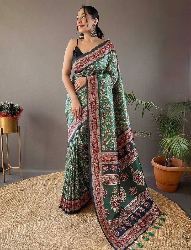 green kalamkari saree with blouse piece