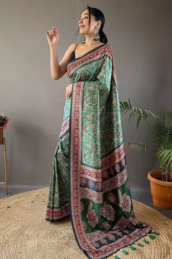 green kalamkari saree with blouse piece